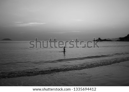 girl at sunrise in black and white