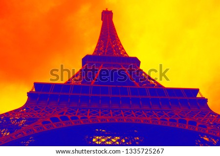 Eiffel Tower against dramatic sky toned in pop art colors. Paris, France. Copy space for text. Romantic and travelling concept.