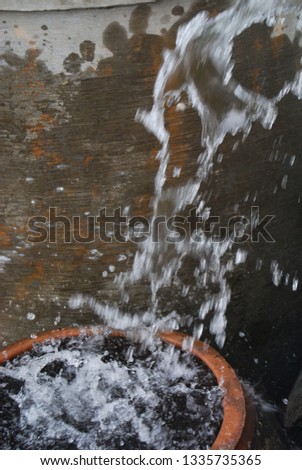 Royalty high quality free stock photo rainwater is pouring into the reservoir, photographed under the rain in the countryside of southern Vietnam