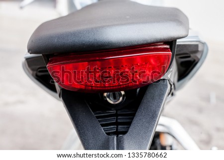 The tail light of the big bike