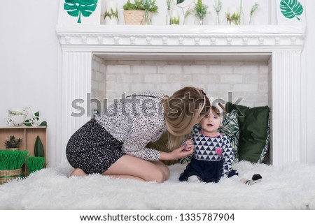 Happy loving family. mother and child girl playing, kissing and hugging. Happy mothers day.