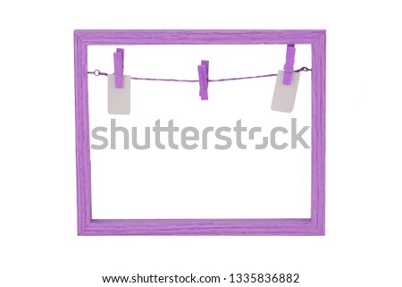 Empty wooden frame. Close-up of Empty violet wooden frame with a clothesline and clothespins on background of frame Isolated on white. Food recipe, valentine, mothers or others festivals. Macro.