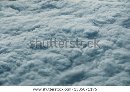 Texture of a beautiful sky full of fluffy clouds. Nature background. 