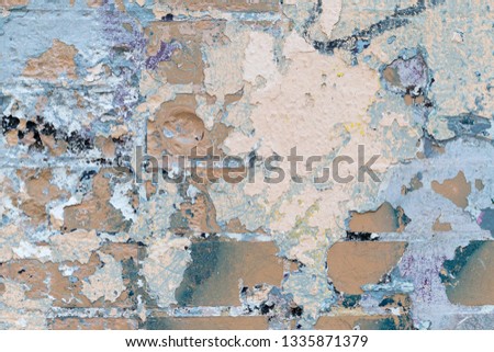 Abstract background of brick wall, texture with spots and layers of old paint with scratches, cracks. Futuristic painted wall