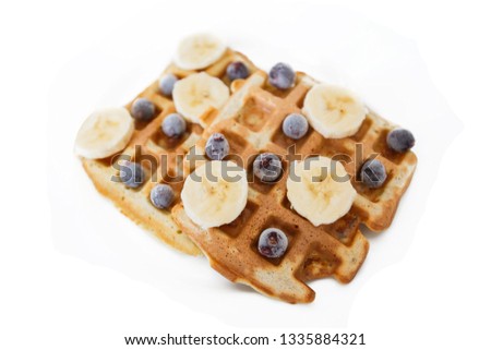 
Fresh waffles with blueberries on white background