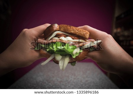 Sandwich. Hands. Ready to eat. 