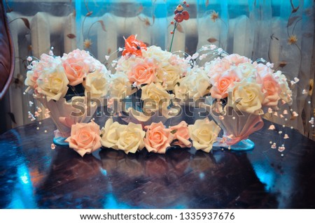 home preparation for the wedding, budget decoration of the house and tables, bouquets for tables of white and pink roses