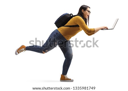 Full length profile shot of a female student running with a laptop isolated on white background