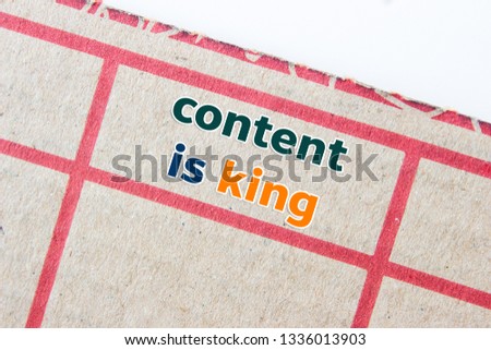 Text message Content is king on old paper box.