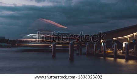 Long exposure of boat travelling near Darling Harbour