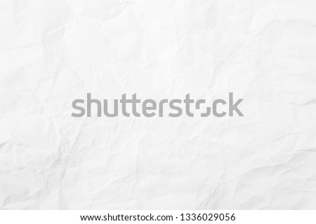 paper crease or crumpled , abstract texture white background. Royalty-Free Stock Photo #1336029056