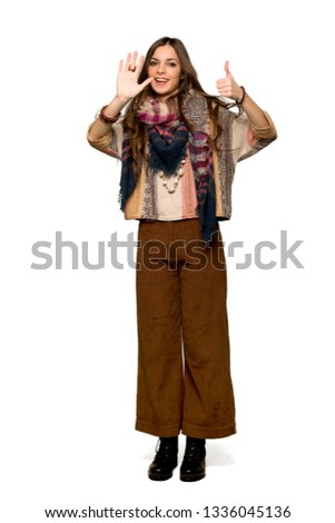 Full-length shot of Young hippie woman counting six with fingers on isolated white background