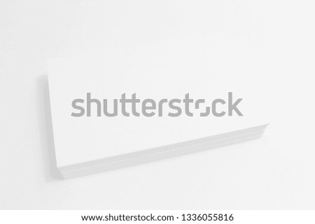 Mockup of business cards on white textured paper background