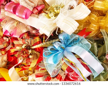 Colorful ribbons with bows background