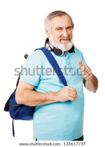 Senior tourist gives the thumb up sign