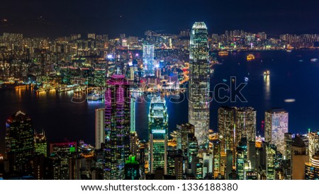 Hong Kong city view from The Peak at night, Victoria Harbor view from Victoria Peak at night, Hong Kong.