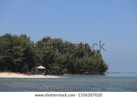 Menjangan island in Karimun, Java, Jepara, Central Java, has beautiful white sand, here there are also shark breeders, can enjoy clear water and clean sand