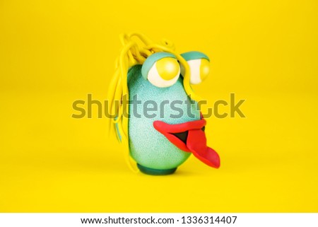 Easter Egg Cartoonish Character With Plasticine Eyes, Mouth and Hair Having an Expressive Face