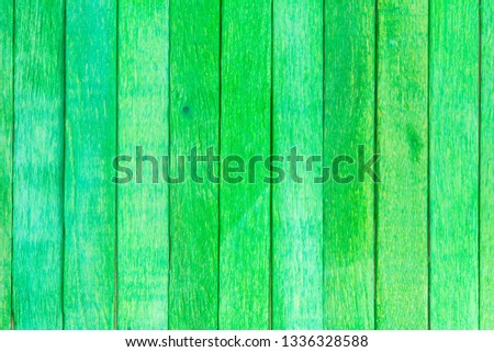 Landscape of green color wood planks for background texture. Creative multicolored wood design concept. Close up of wood table, line, row, wooden floor for interior design with copy space for text.