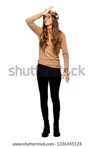 Full-length shot of Young woman with beret has just realized something and has intending the solution on isolated white background