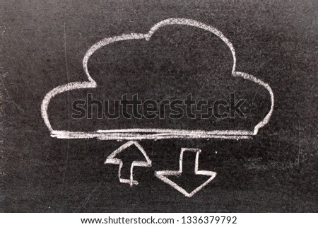 White chalk hand drawing in cloud with up and down arrow icon shape on black board background (Concept for cloud computer download and upload data, connection or transfer data)
