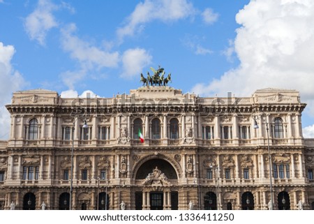 Beautiful scenic picture of the Supreme Court of Cassation over the Tiber river in Rome, Italy - historical building against blue sky