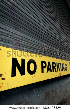 no parking sign warehouse door 