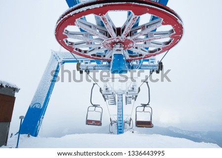 ski lift in the snowy mountains