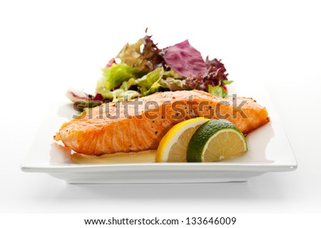 Grilled Salmon with Fresh Salad Leaf Royalty-Free Stock Photo #133646009
