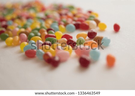 Colorful Jellybeans Candy on Table White Background Sweets Food Daylight Green Pink Yellow Blue sweet sugar