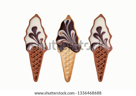 Traditional shortbread cookies like ice cream with colorful icing. White background.