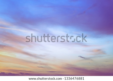 Twilight sky with effect of light pastel tone. Colorful sunset of soft clouds. 