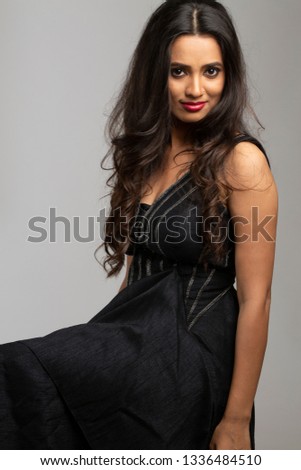 Portrait of Indian woman wearing black dress