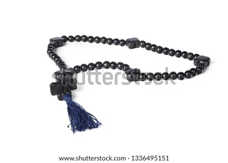 Rosary wooden beads on white background
