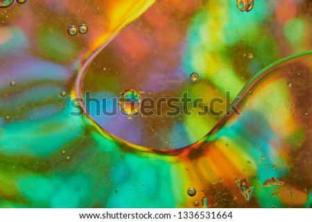 abstract background of stains and paint bubbles in liquid