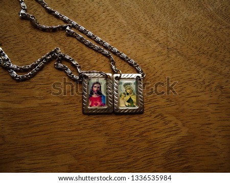 scapular with a Christian and religious theme, with Saint Mary and Jesus Royalty-Free Stock Photo #1336535984