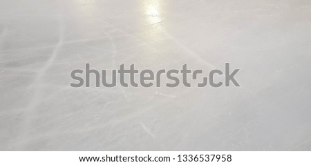 Ice rink floor surface background and texture in winter time, ice hockey sport ground 