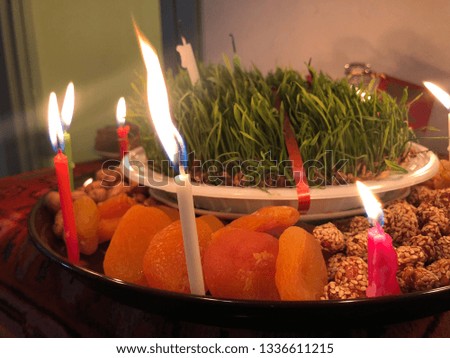 "Semeni" grass decoration is grown 2 weeks in advance to have it ready on the table by March 20, the night of Novruz celebration in Azerbaijan and 