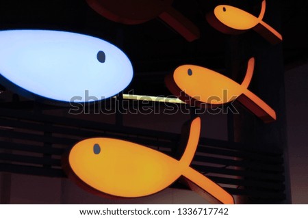 Desigh Orange fish and blue fish for food shop