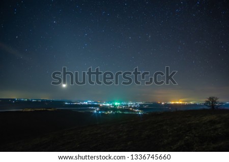 Night village on a background of the starry sky