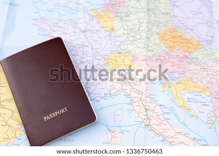 Passport on a map of the world. Europe map on a background.Traveling Journey Vacation Holiday concept.