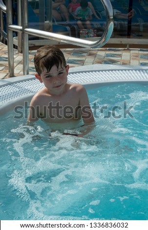 
  
Boy swimming in the pool
