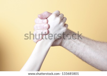 two hand fighting, man and boy