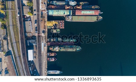 Aerial view of the Port Harbor in Odessa with moored ships of different purposes, Ukraine. Top view. Drone shot