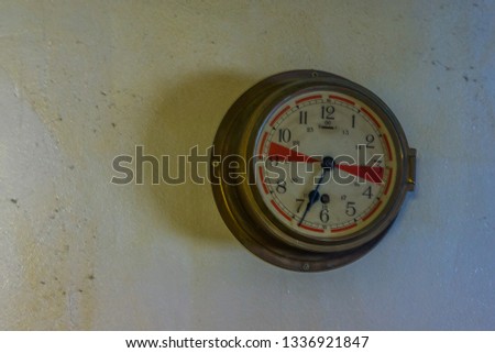 vintage pressure meter on a wall, vintage technology and equipment