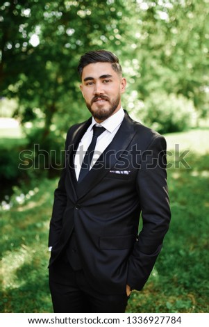 Portrait Of A Successful Businessman Smiling At The Camera