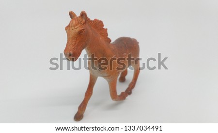 brown plastic horse toy