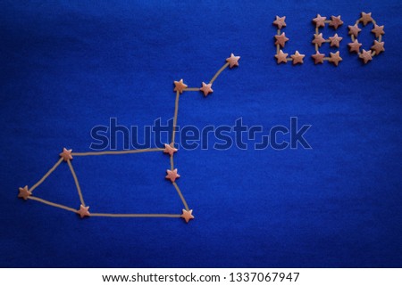 The zodiacal constellation of Leo, the eastern horoscope. Schematic arrangement of stars on a blue surface. Vignetting. The picture is made by the author.