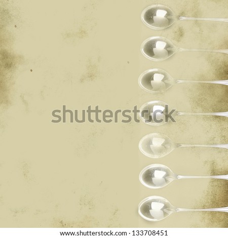 Silver spoons grunge background