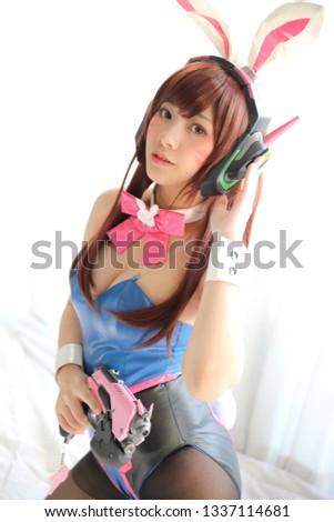 Japan anime cosplay , portrait of girl cosplay in white room background